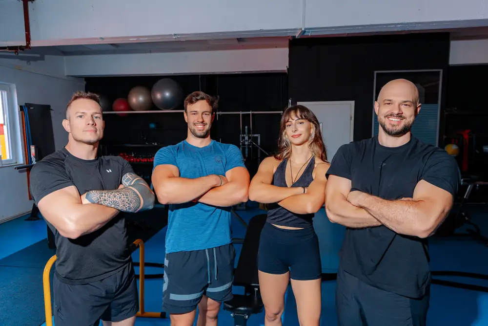 The crew at the gym, arms crossed